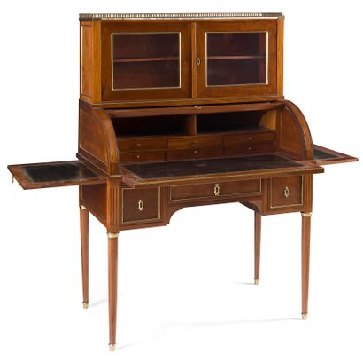 null MAHOGANY CYLINDER SECRETARY

opening with three drawers, two sashes and a cylinder...