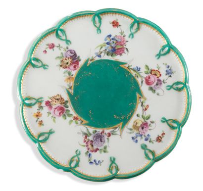 null SEVRES

FOOT SAUCER IN SOFT PORCELAIN

with polychrome decoration of garlands...