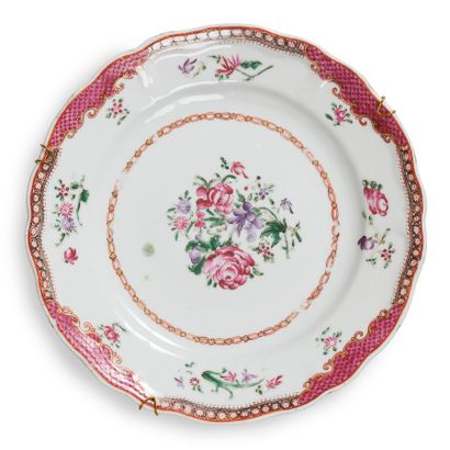 null THREE PINK FAMILY CHINA PLATES

China, 18th century.

Two floral plates, one...