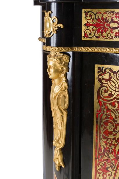 null RED TORTOISESHELL AND BRASS MARQUETRY CABINET

decorated with foliage scrolls,...