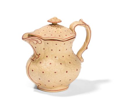 null LAHENS AND RAKE

COVERED JUG IN FINE BEIGE EARTHENWARE

with relief decoration...