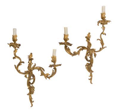 null PAIR OF GILDED BRONZE LIGHT ARMS

with two animated and leafy lights with openwork...