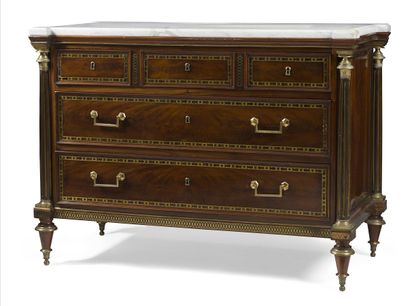 null MAHOGANY FLAME CHEST OF DRAWERS WITH BRASS INLAYS

the recessed white marble...