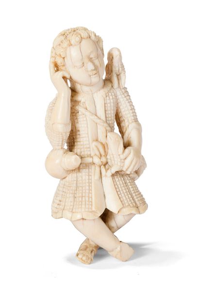 null SMALL CARVED IVORY FIGURE

A child with two lambs.

Portuguese Indies, late...