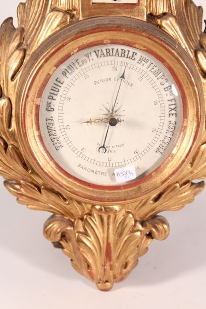 null Barometer in the taste of the XVIIIth century, in carved and gilded wood with...