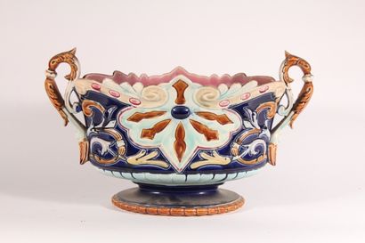 null Planter in barbotine with polychrome plant decoration

Circa 1900

Height: 25...