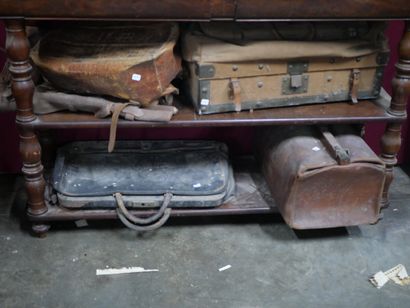 null Set of twelve canvas and leather trunks and suitcases, including a travel trunk...