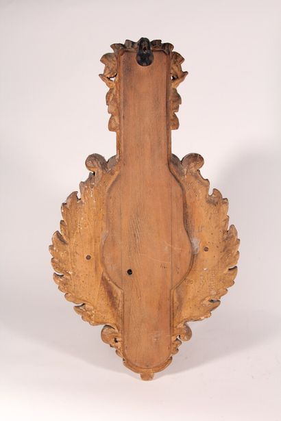 null Barometer in the taste of the XVIIIth century, in carved and gilded wood with...