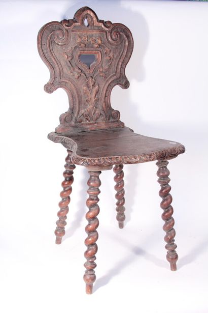 null Pair of moulded and carved oak stepladders, the backrest decorated with foliage...