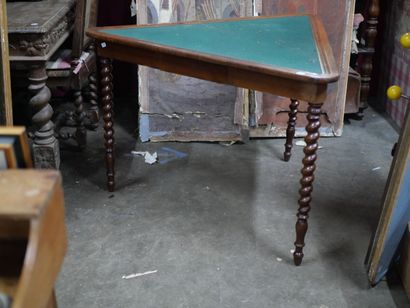 null Mahogany triangular games table, twisted base 

nineteenth century

Height:...