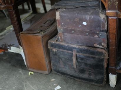 null Set of twelve canvas and leather trunks and suitcases, including a travel trunk...