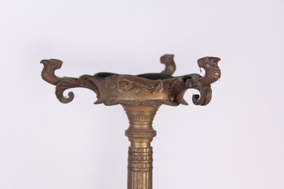null Pair of brass firebars and brass firebars with stylized flowers and foliage...