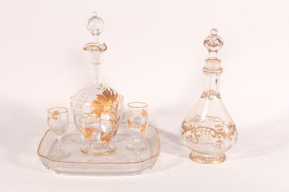 null Crystal liqueur service with golden flower enamel decoration

Circa 1900

A...