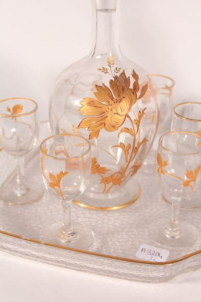 null Crystal liqueur service with golden flower enamel decoration

Circa 1900

A...