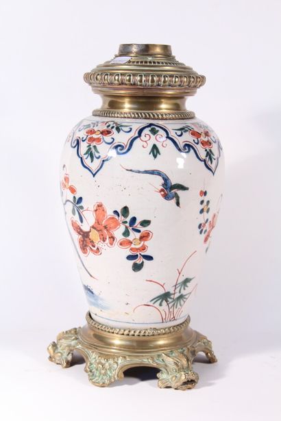 null Delft earthenware vase of baluster shape, polychrome decoration of birds, flowers...
