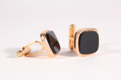 null Murat, pair of gold plated and black glass cufflinks.