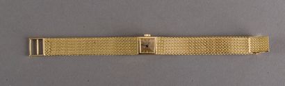 null Bracelet watch of lady in yellow gold 750 thousandths, square case, gilded dial...