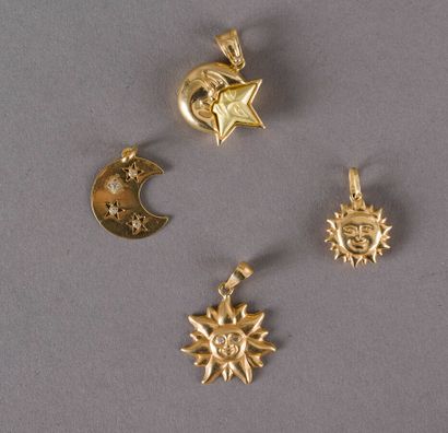 null Four pendants in yellow gold 750 thousandths: moons and suns 8,8 g.