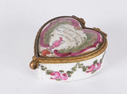 null A porcelain cordial box with painted polychrome decoration, the lid decorated...