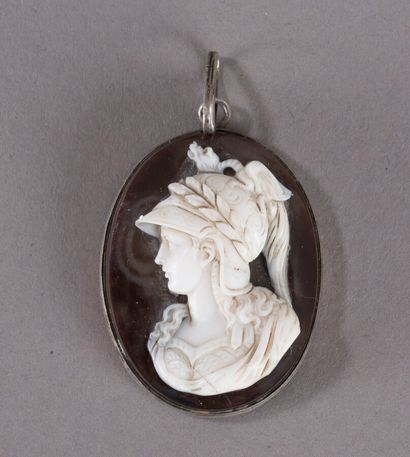 null Oval silver pendant with a beautiful cameo on sardony showing the profile of...