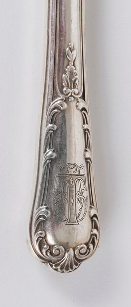 null Twelve fruit knives, the handles in filled silver with shells and foliage decoration,...