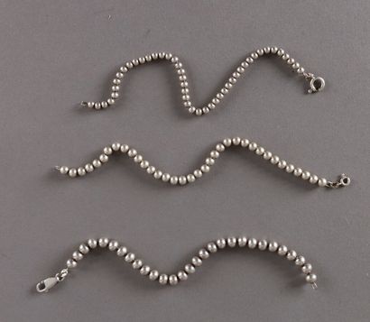 null Three silver bead bracelets 27 g.