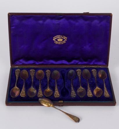 null Twelve English silver vermeil mocha spoons. The handle and the spatula with...