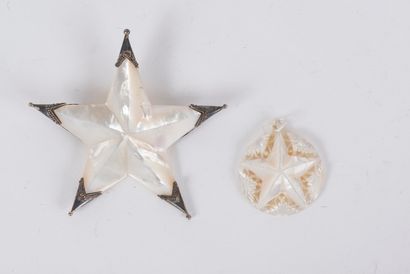 null Two mother-of-pearl five-pointed stars: one mounted as a brooch with silver...