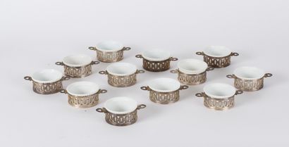 null Twelve individual white ceramic ramekins, silver plated metal frame with oval...