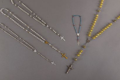null Five silver plated and faceted glass rosaries with two rosary cases.
