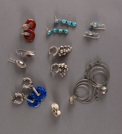 null Eight pairs of earrings in silver or silver plated metal and hard stones 80...