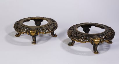 null A pair of Napoleon III bronze pedestals, with orientalist decoration. They stand...
