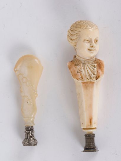 null Two stamps of the XIXth century: a mother-of-pearl handle with pastilles and...