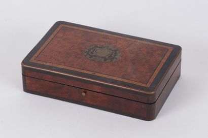 null A token box, decorated with flamed mahogany and ebony marquetry, the lid decorated...