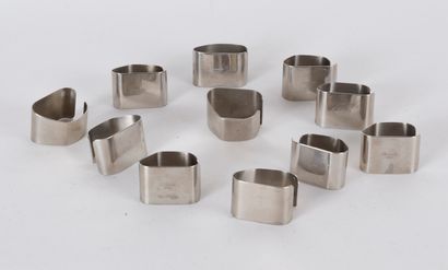 null Eleven open napkin rings in silver-plated metal from the houses of Christofle...
