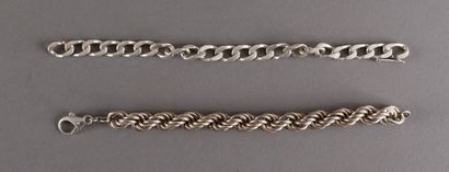 null Two supple bracelets in silver 925 thousandths: a mesh gourmette and a twisted...