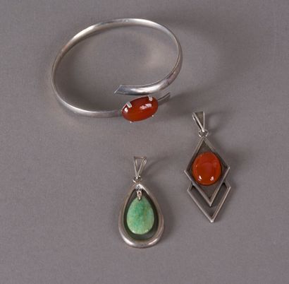 null A silver half-bracelet and two pendants, carnelian cabochons and amazonite drop,...