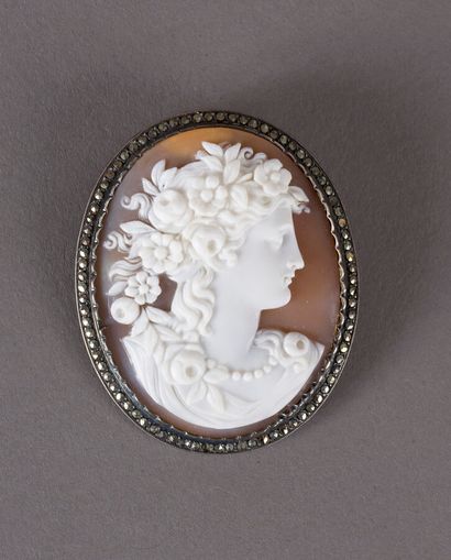 null Oval brooch set with a shell cameo in profile of Ceres, her hair decorated with...