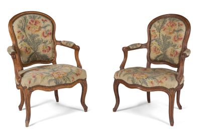 null TWO BEECHWOOD ARMCHAIRS WITH MOULDINGS OF A MOVING SHAPE

the rounded cabriolet...