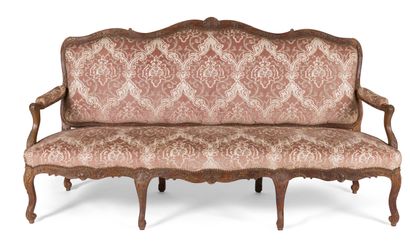 null MOULDED AND CARVED WOODEN SOFA

decorated with foliage and stylized flowers,...