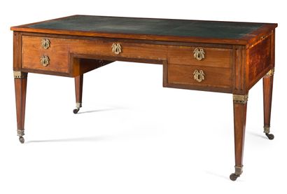 null ROSEWOOD AND AMARANTH FLAT DESK

opening with four drawers and resting on sheath...