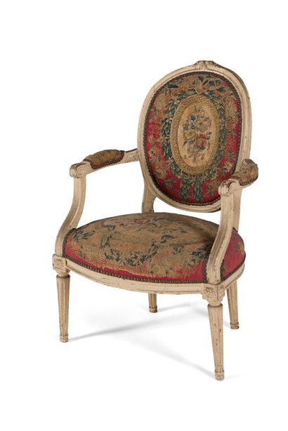 null PAINTED WOODEN ARMCHAIR WITH MEDALLION BACK

decorated with flowers. (belt strapped...