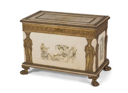 null PARCHMENT CHEST

decorated with a quadriga in the taste of Antiquity, brass...