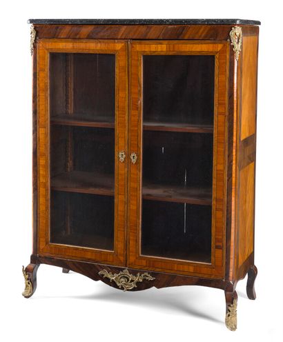 null ROSEWOOD, VIOLET WOOD AND ROSEWOOD BOOKCASE

opening with two glass doors, the...