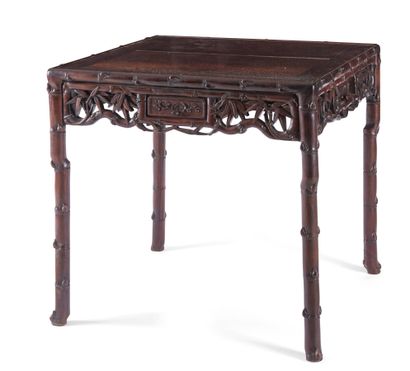 EXOTIC WOOD CARVED TABLE AND ARMCHAIR

South...