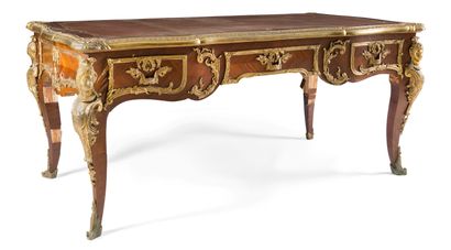 null LARGE FLAT DESK IN AMARANTH

opening with three drawers, the falls in gilded...
