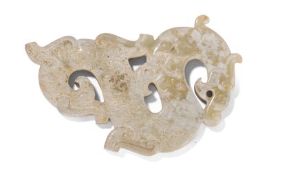 null JADE PENDANT

China.

In the form of an archaizing dragon, in the Han style.

H.:...