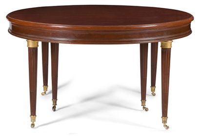 null MAHOGANY DINING ROOM TABLE

circular shape, resting on six tapered legs with...