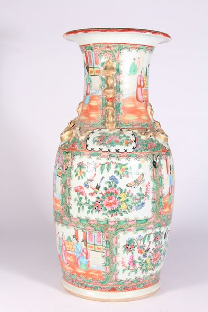 null Canton porcelain vase of baluster form decorated with palace scenes, butterflies...