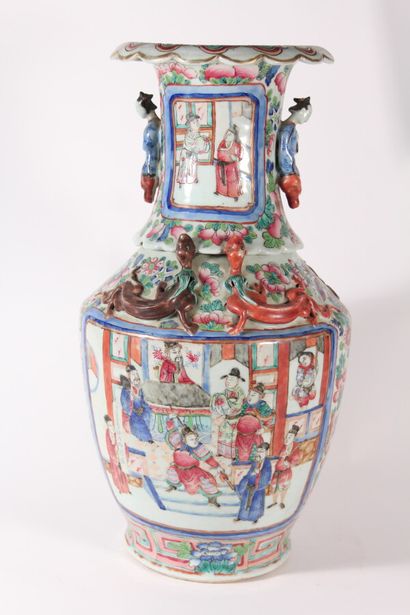 null Porcelain vase with polychrome decoration in reserve of palace scenes and relief...